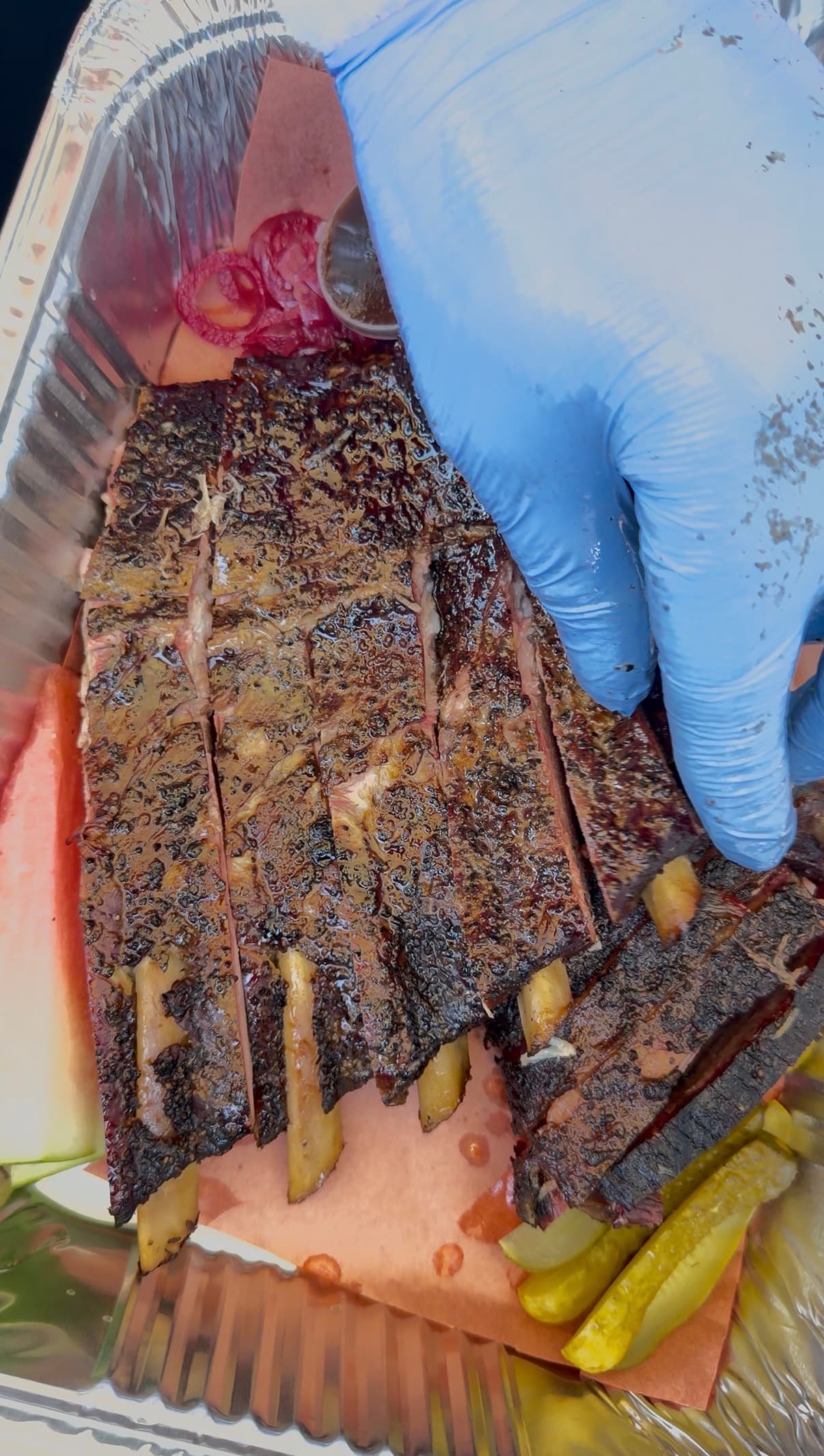 BBQ trays prepared for catering portion planning