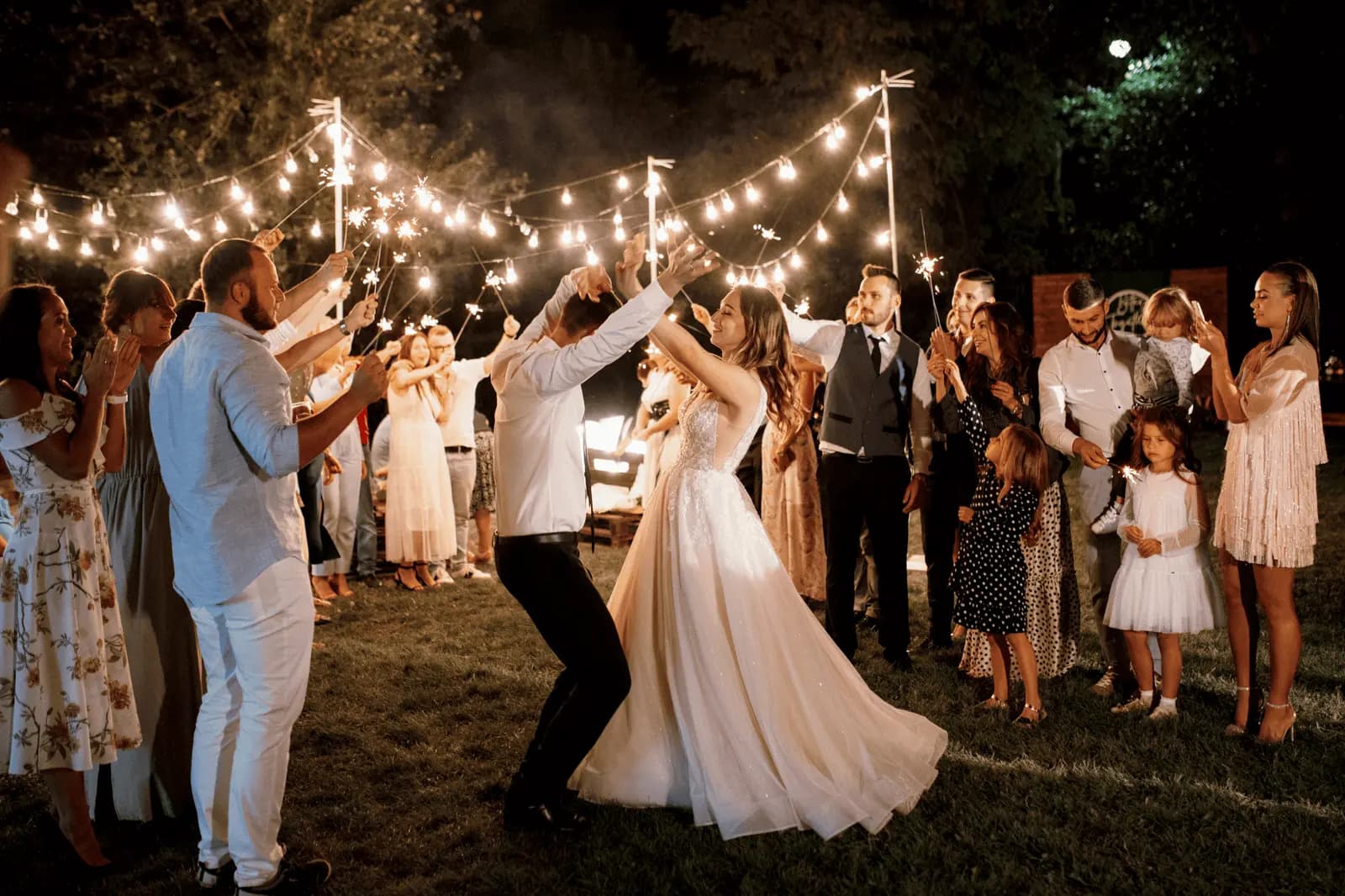 Guests talking and moving through a relaxed private celebration